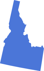 A blue icon in the shape of the US state of Idaho symbolizing pre-settlement funding in Idaho