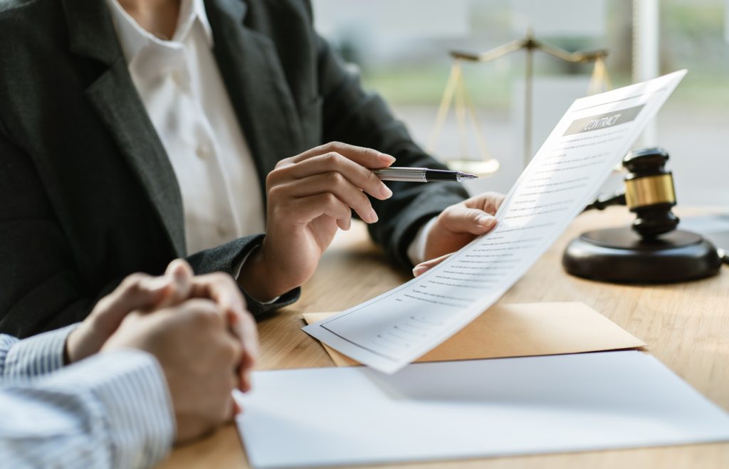 Businessman and Male lawyer or judge consult having team meeting with client, Law and Legal services concept.
