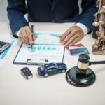 A lawyer specializes in auto auctions and legal matters, navigating vehicle accidents, insurance claims, courtroom procedures, and judicial decisions for clients seeking justice and compensation